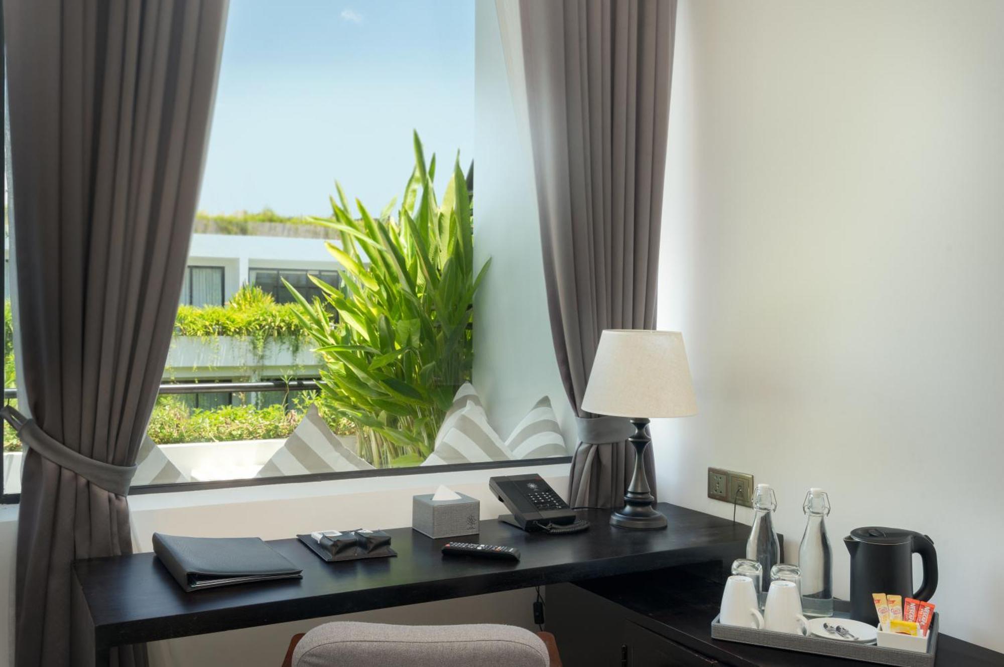 Eightfold Urban Resort Siem Reap Exteriér fotografie A room at the hotel